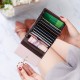Accordion leaf mini compact card holder for women, simple ultra-thin coin purse with multiple slots and a credit card holder.