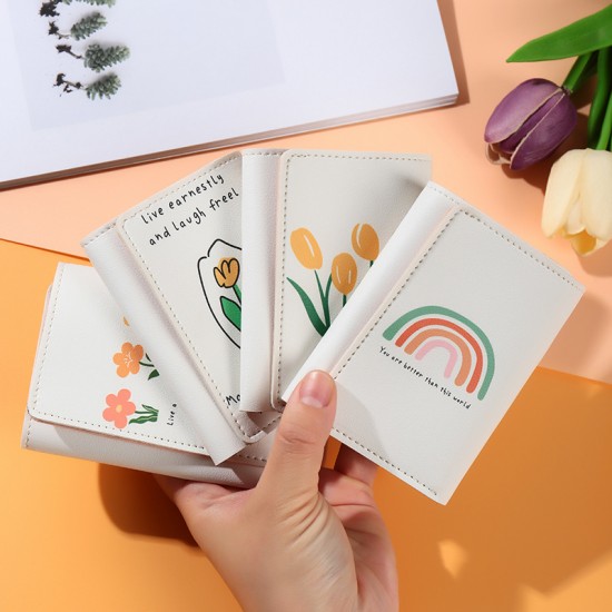 INS ultra-thin short tri-fold wallet for women, with simple prints and a cute sentimental student folding wallet.
